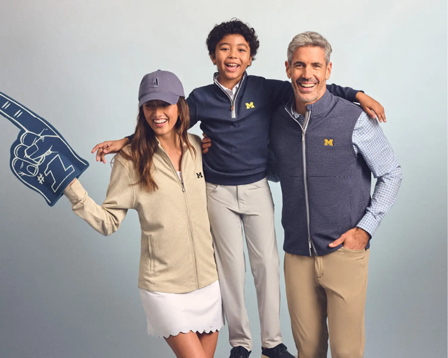 Family wearing University of Michigan apparel