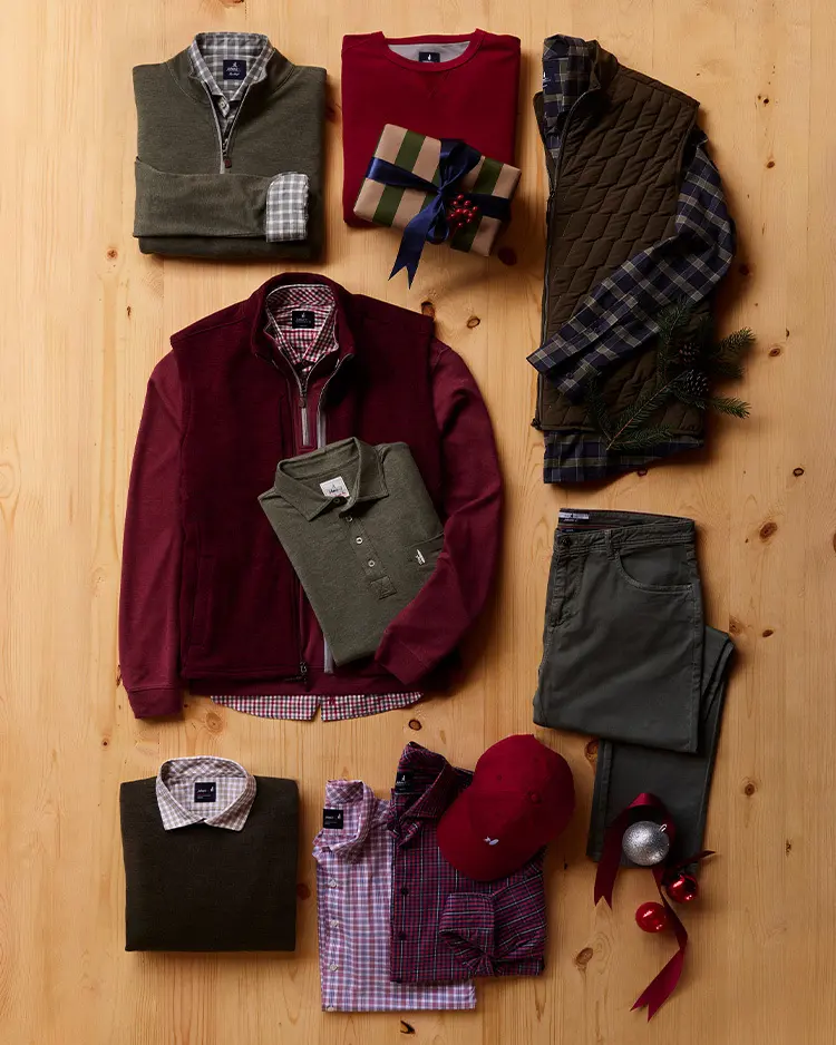 An assortment of holiday apparel gifts for men including polos, vests, sweaters, and button down shirts.